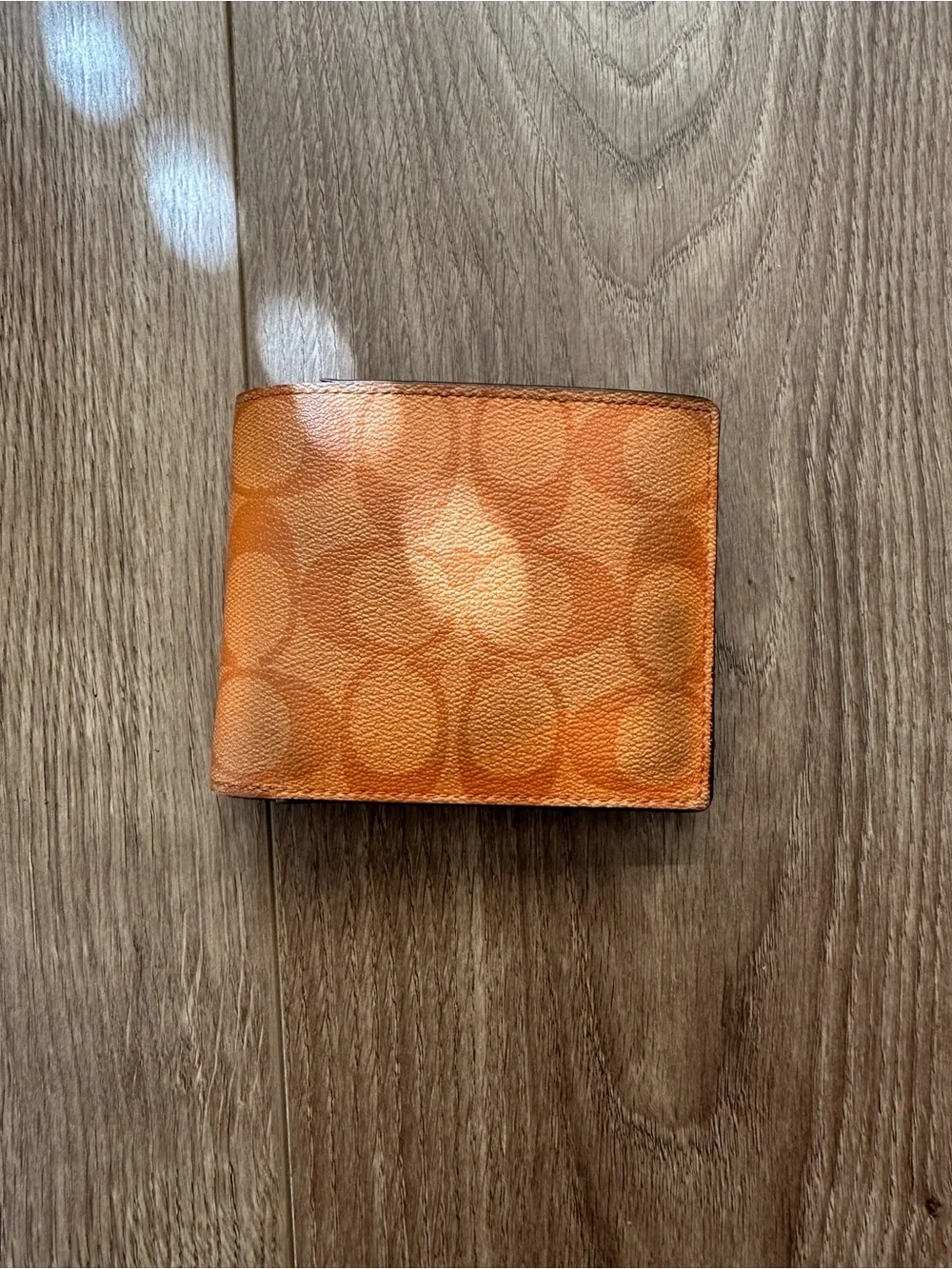 Coach Orange Signature Pattern Bifold Wallet